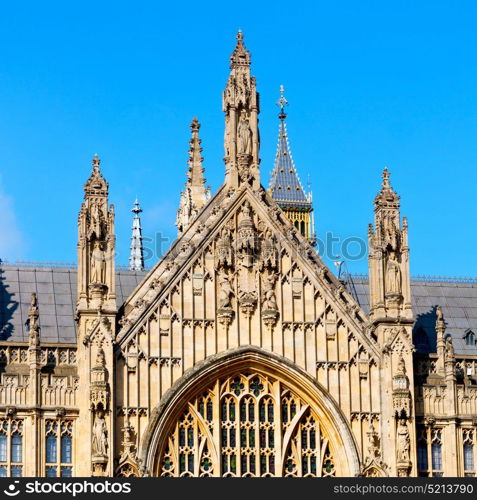 in london old historical parliament glass window structure and sky