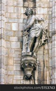 in milan italy statue of a women in the front of the duomo church and incision
