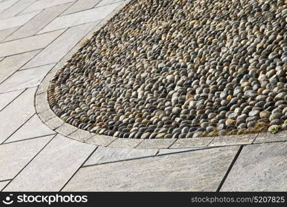 in mozzate street lombardy italy varese abstract pavement of a curch and marble