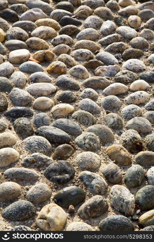 in mozzate street lombardy italy varese abstract pavement of a curch and marble