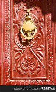 in oman antique door entrance and decorative handle for background