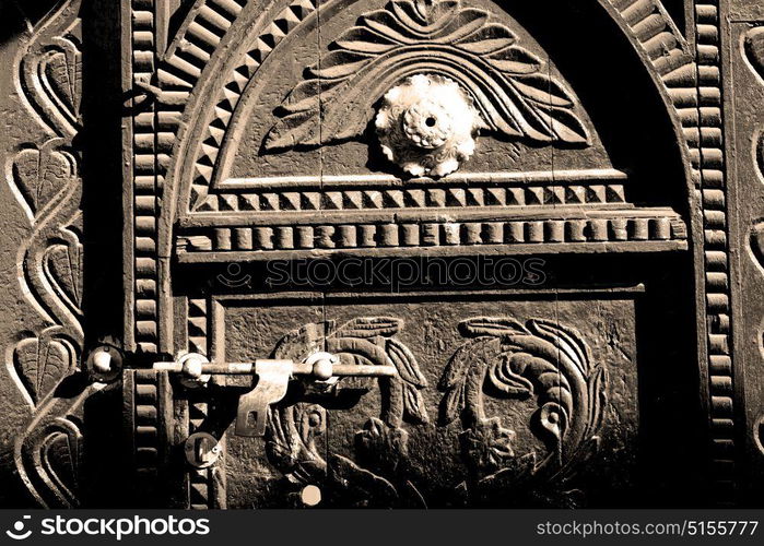 in oman antique door entrance and decorative handle for background