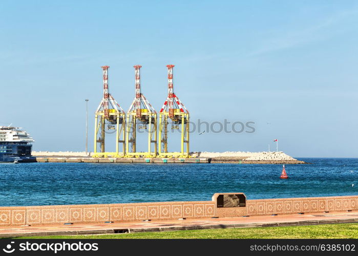 in oman muscar the port and the crane in the harbor near the sky