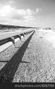 in oman old asphalt road near the coastline