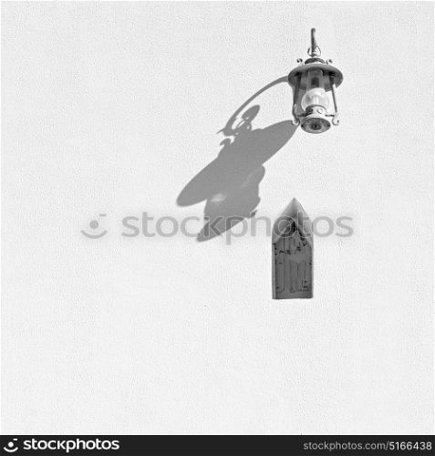 in oman the street lamp in a old wall
