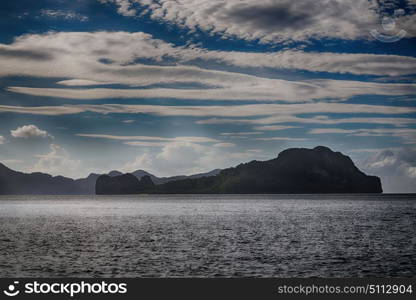 in philippines island the pacific ocean clouds and lights view from a boat