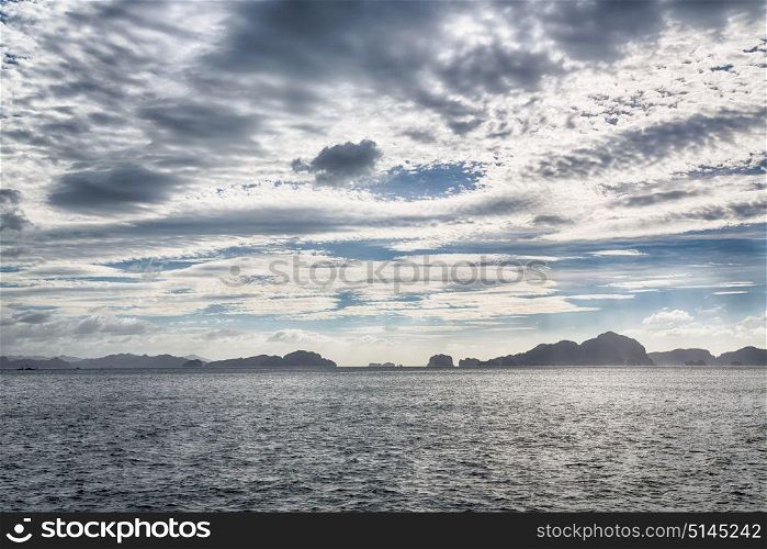 in philippines island the pacific ocean clouds and lights view from a boat