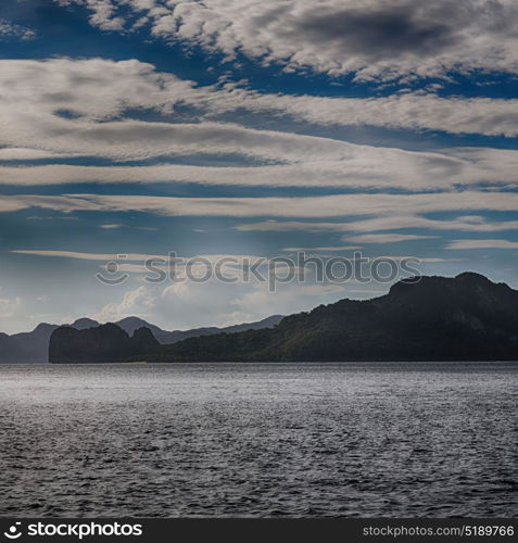 in philippines island the pacific ocean clouds and lights view from a boat