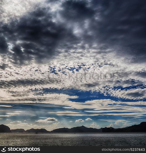 in philippines island the pacific ocean clouds and lights view from a boat