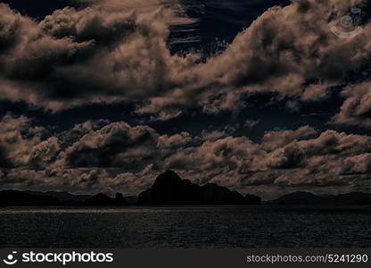 in philippines island the pacific ocean clouds and lights view from a boat