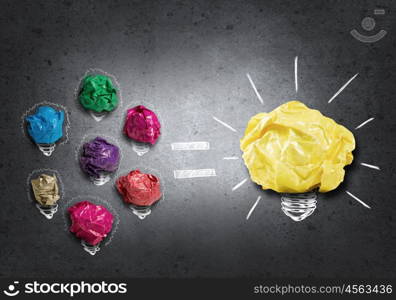 In search of creative idea. Set of colourful crumpled paper balls on grey surface