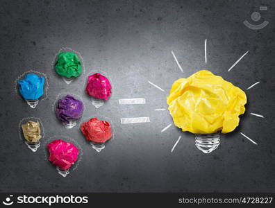 In search of creative idea. Set of colourful crumpled paper balls on grey surface