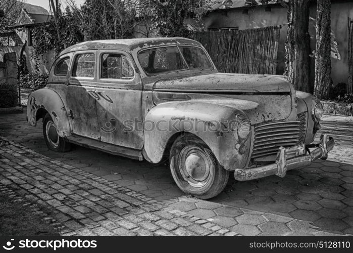 in south africa old abandoned american vintage car and the house courtyard