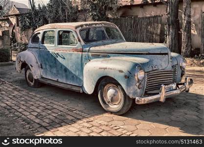 in south africa old abandoned american vintage car and the house courtyard