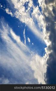 in the busto arsizio lombardy italy varese abstract ckoudy sky and sun beam