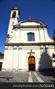 in the caidate old church closed brick tower sidewalk italy lombardy