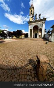 in the cairate old church closed brick tower sidewalk italy lombardy