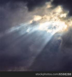 in the cloudy sky a ray of light like concept of holy paradise and  peace