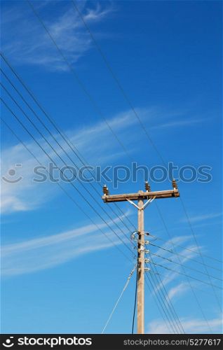 in the cloudy sky and abstract background current pole electricity line