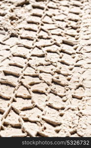 in the desert beach track of car and truck in the sand like abstract background