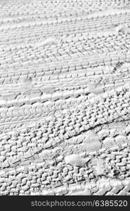 in the desert beach track of car and truck in the sand like abstract background