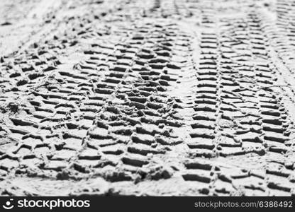 in the desert beach track of car and truck in the sand like abstract background