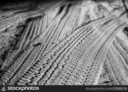 in the desert track of car and truck in the sand like abstract background