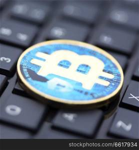 in the keyboard of a computer the coin of bitcoin like concept of future and investment 