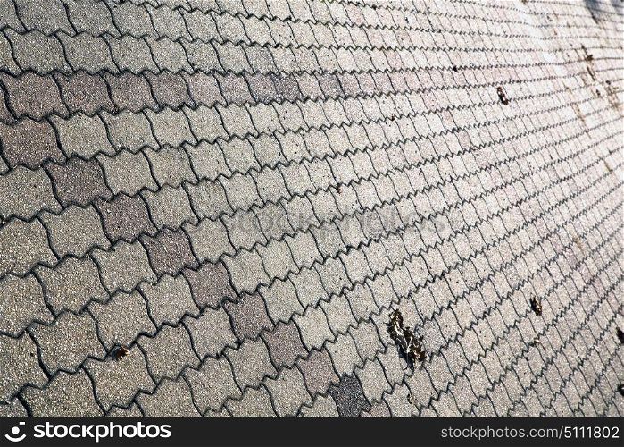 in the legnano street lombardy italy varese abstract pavement of a curch and marble