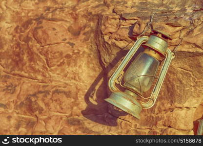 in the rock desert of jordan an antique old fashioned lamp isolated