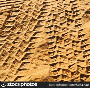 in the sand and direction texture oman desert track of some cars