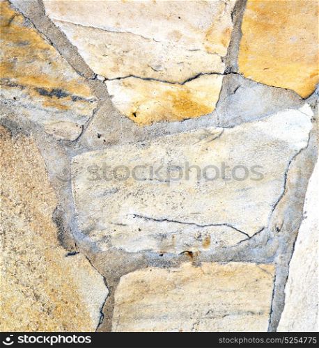 in the santo antonino street lombardy italy varese abstract pavement of a curch and marble