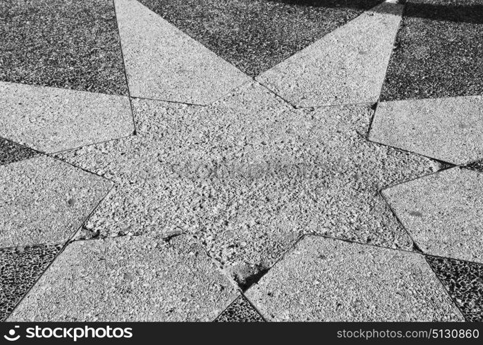 in the sidewalk star made of stone like background