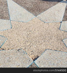 in the sidewalk star made of stone like background