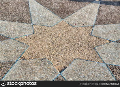 in the sidewalk star made of stone like background