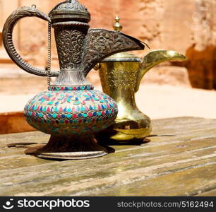 in the site of petra jordan the traditional coffe container isolated on a table