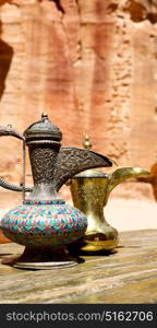 in the site of petra jordan the traditional coffe container isolated on a table