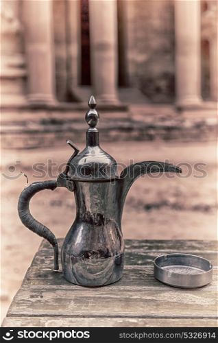 in the site of petra jordan the traditional coffe container isolated on a table