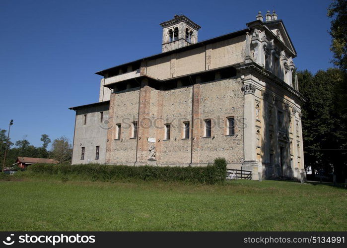 in the somma lombardo old church closed brick tower sidewalk italy lombardy