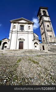 in the somma lombardo old church closed brick tower sidewalk italy lombardy