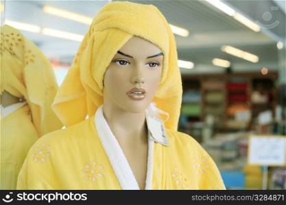 in the store - mannequin weared yellow bath clothes