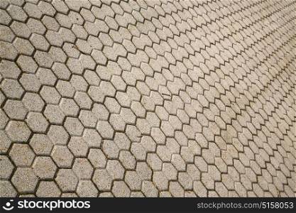 in the varano borghi street lombardy italy varese abstract pavement of a curch and marble