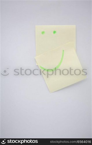 in the white background and empty space the smile in the post like concept of happiness