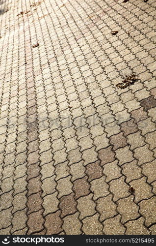 in varano borghi street lombardy italy varese abstract pavement of a curch and marble