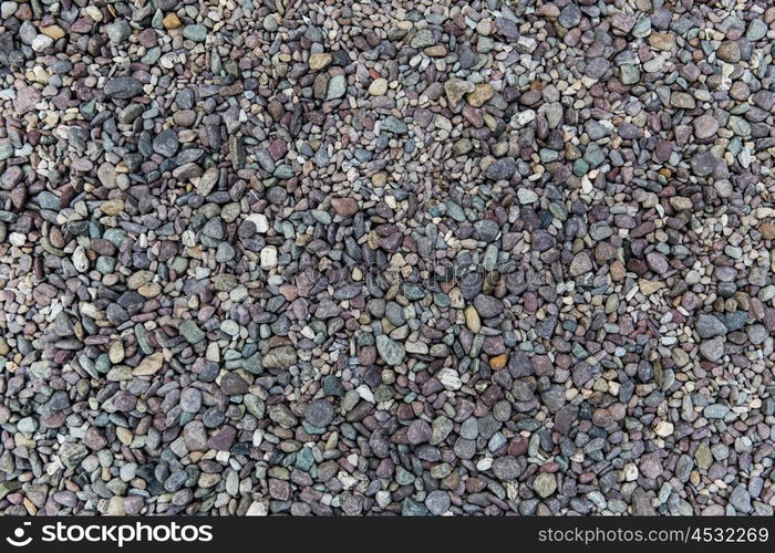 inanimate nature and background concept - close up of beach pebble stones. close up of beach pebble stones