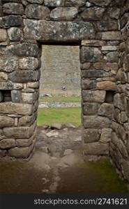 Incan style masonry door at Machu Picchu in Peru.. Commercial Photography