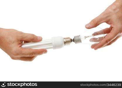 Incandescent and energy-saving lamp in the hands isolated on a white background