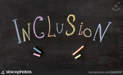inclusion word written colourful chalk