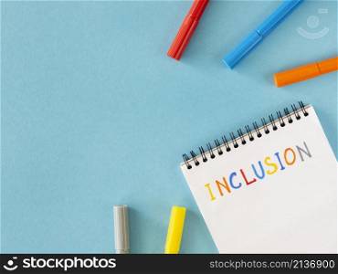 inclusion word written notebook