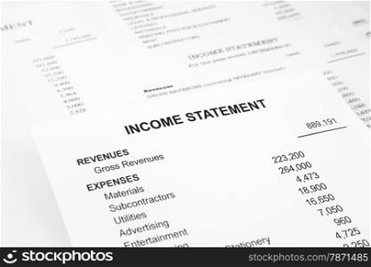 Income statement reports with detail list of revenues and expenses for business accounting concept, black and white tone image